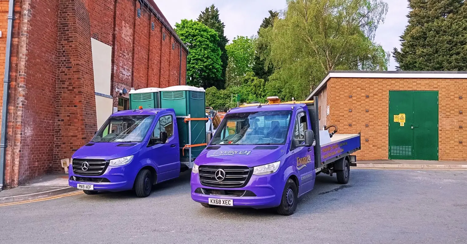 Enviro24 professional fleet - two purple Mercedes vans with portable toilet equipment